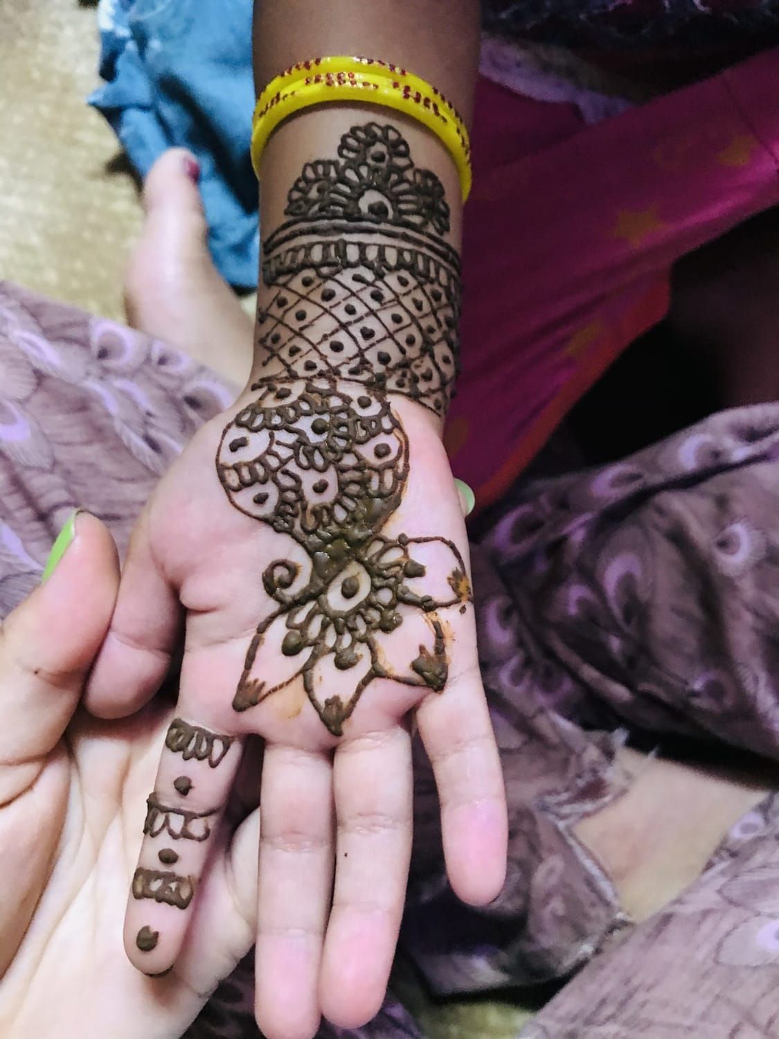 Mehndi henna on hands